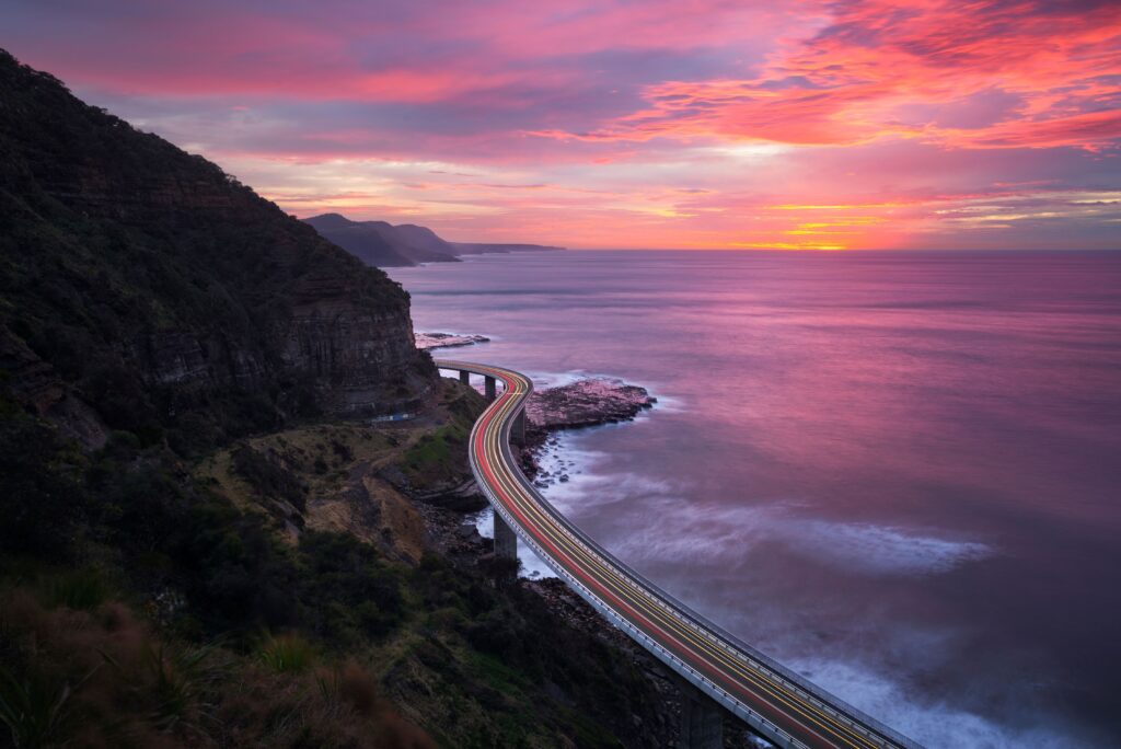 Stunning Sea Cliff Bridge at sunrise hugging the coast, Clifton