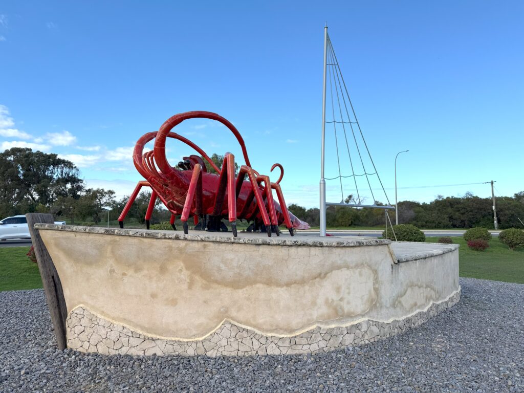 The Big Lobster sits upon a fishing boat at Dongara, Western Australia