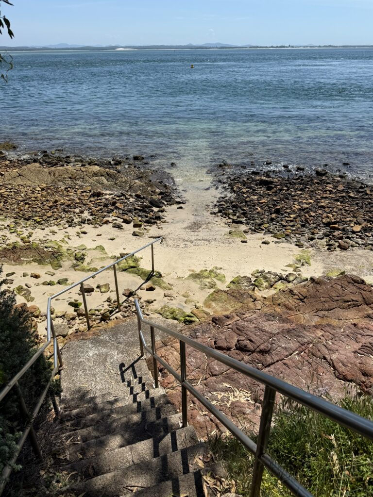 Stairs to the water and path into the water made by scuba divers at Fly Point Aquatic Park