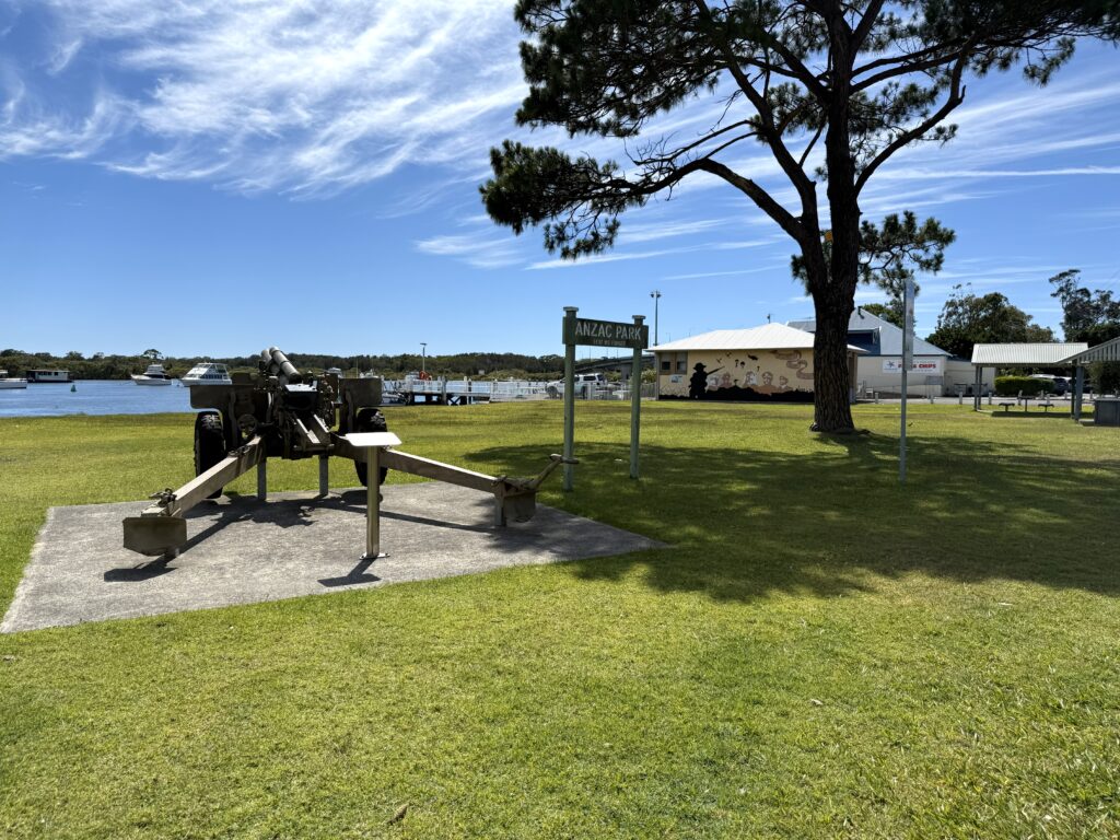Peaceful ANZAC Park with historic guns and boatshed perfect for a rest