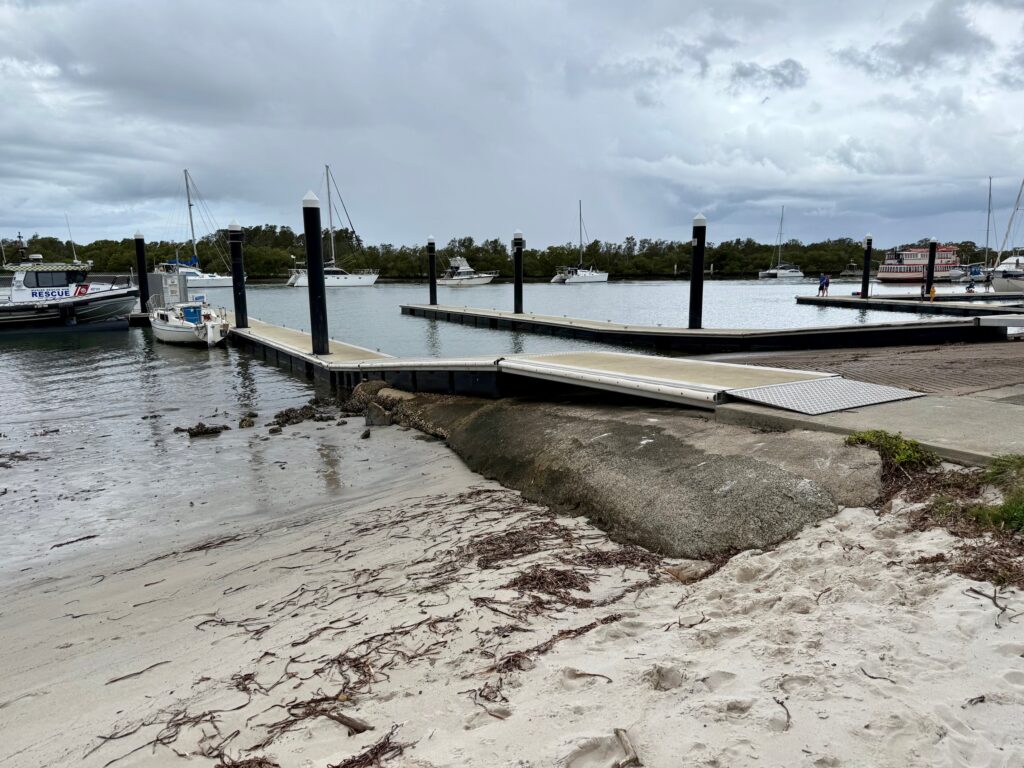 Lemon Tree Passage Boat Ramp showing 3 boat launching lanes with floating pontoons and marine rescue.