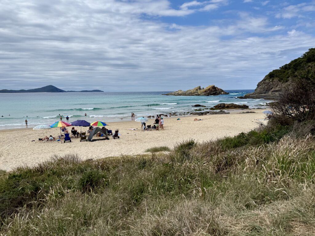 Families enjoying stunning Boat Beach, Seal Rocks