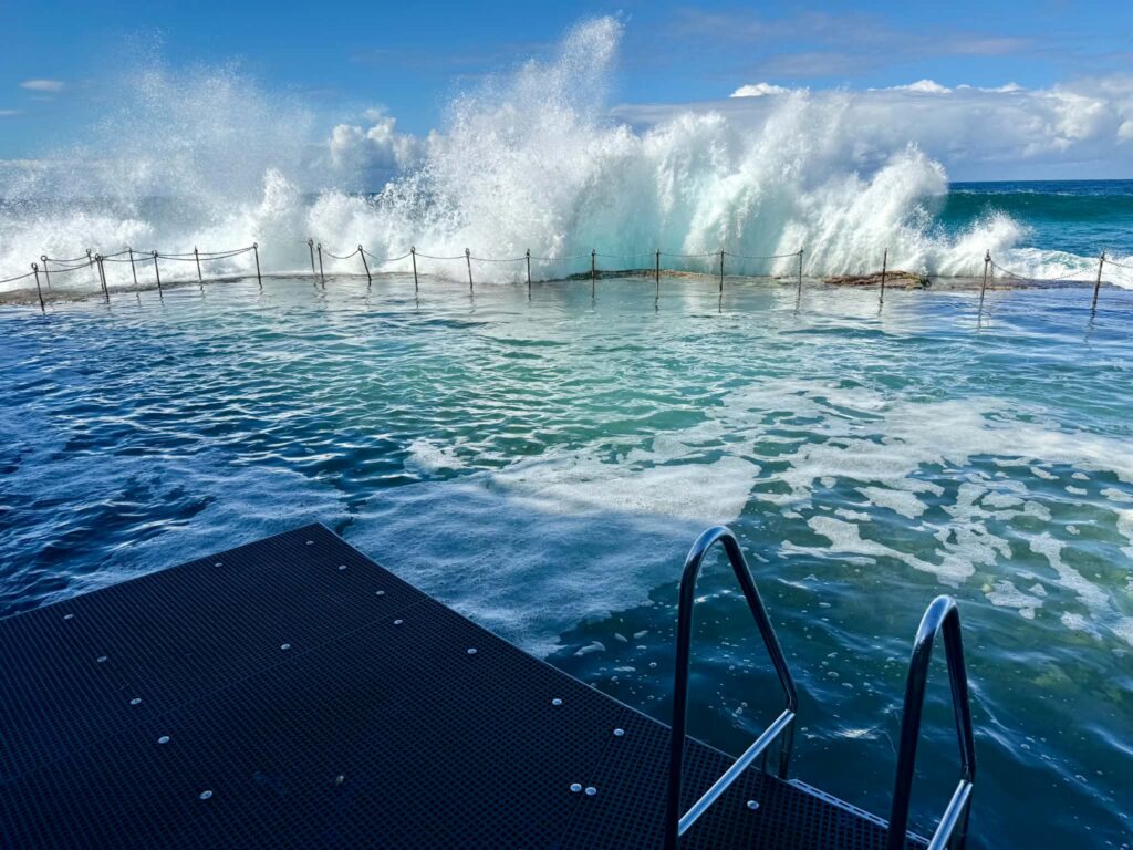 Waves crashing over the Bogey Hole at high tide on a reasonably calm day