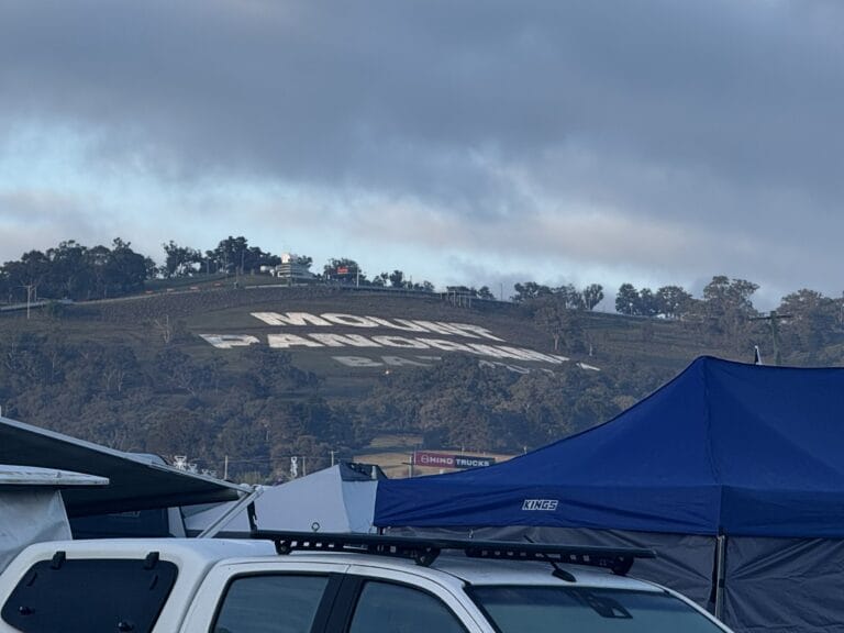 Mount Panorama sign standing boldly in white on the mountain overlooking the Bathurst 1000 racetrack