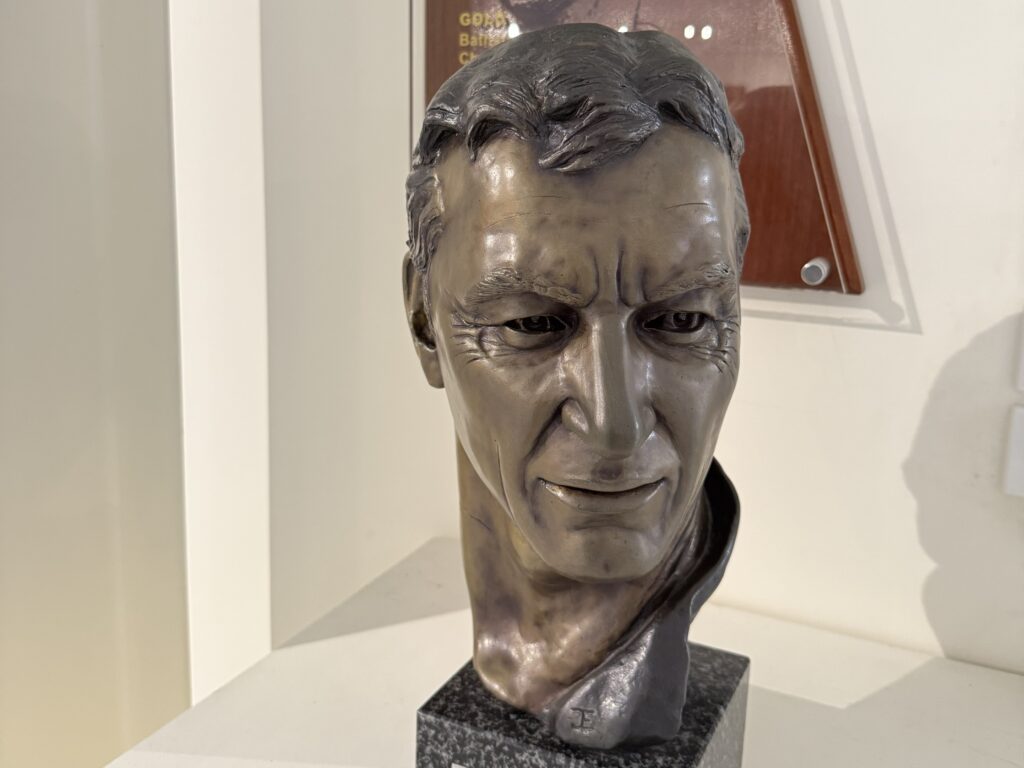 Bronze figure head of Peter Brock - King of the Mountain