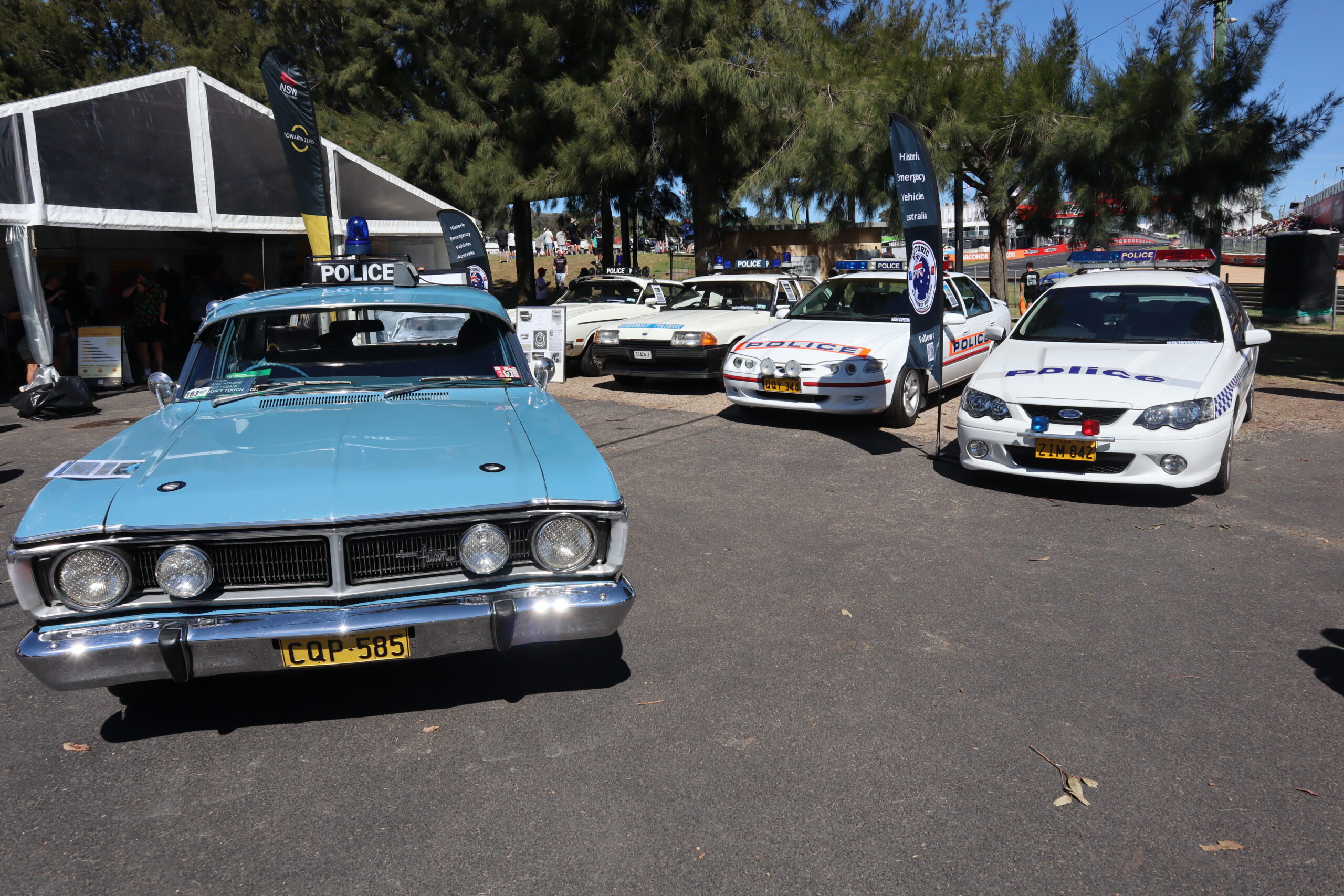Police car exhibition showcasing 5 different eras of police cars at the National Motor Racing Museum
