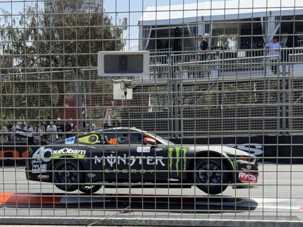 Monster Supercar flying through the beachside chicane at the Gold Coast 500