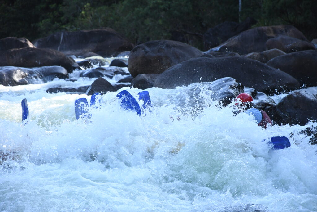 Dunked coming down a rapid - only the tops of our paddles are visible