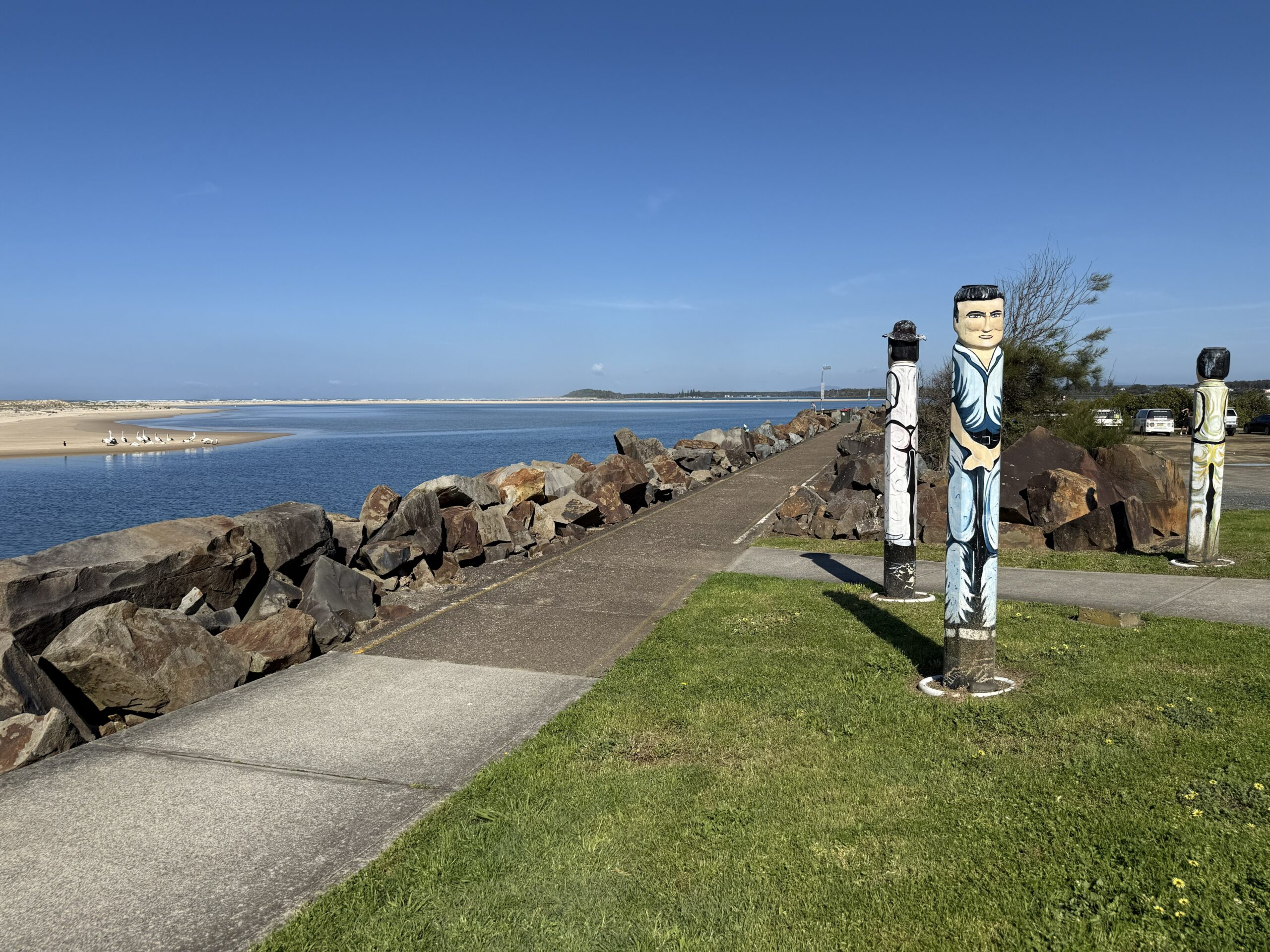 Beginning of the Harrington Breakwall is protected by totem poles.