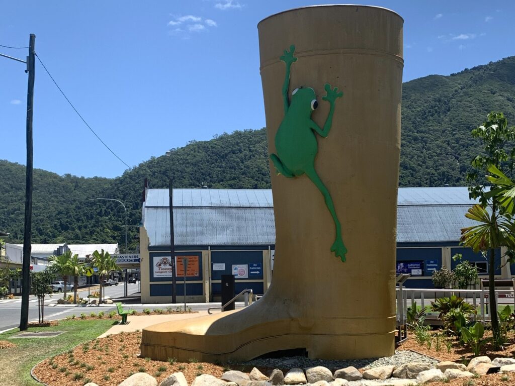 The 7.9m tall Golden Gumboot at Tully with a green tree frog climbing the outside