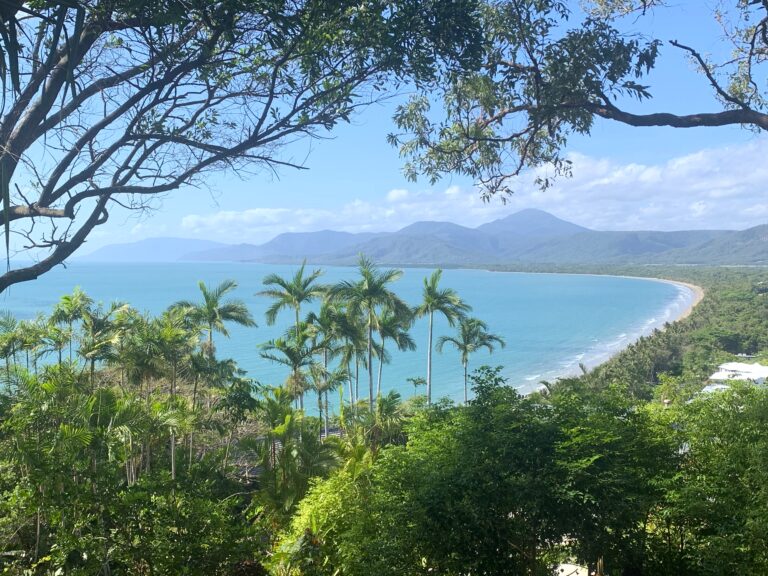 View of the turquoise waters of Four Mile Beach from Flagstaff Hill Lookout in Port Douglas on a clear sunny day.
