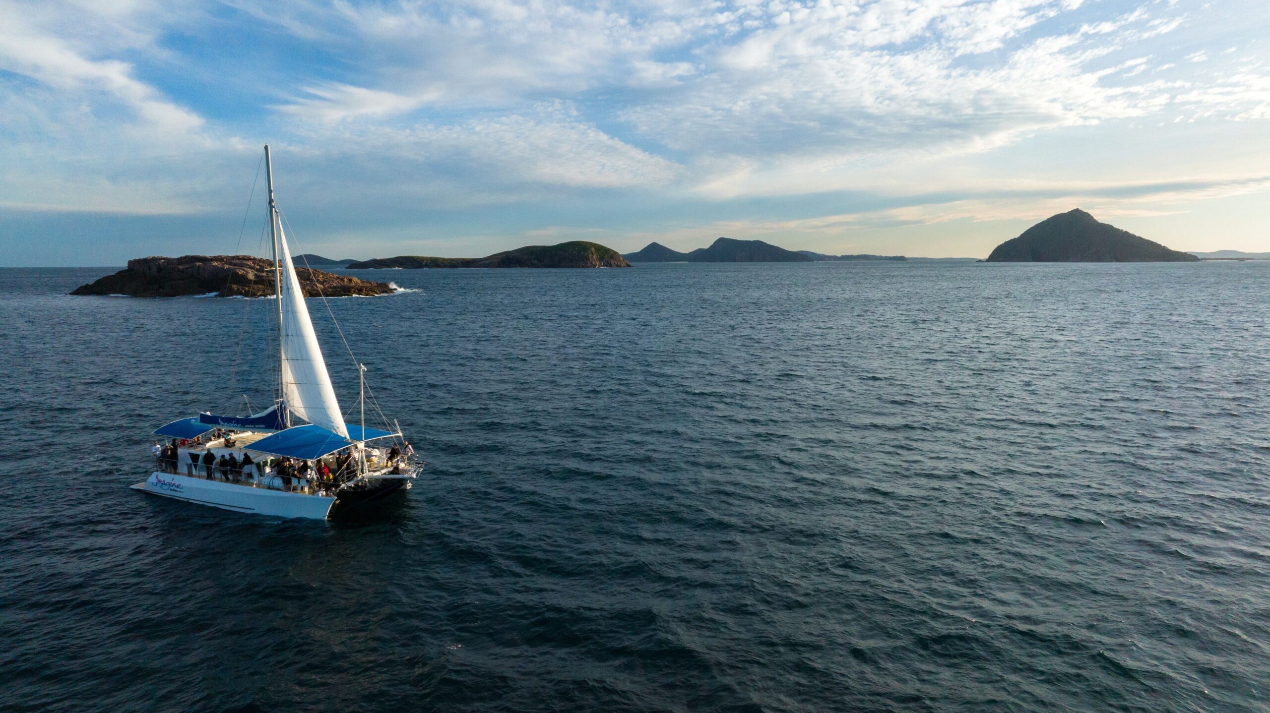 Imagine catamaran sailng through the outer island off Port Stephens is one of the many water activities in Port Stephens.